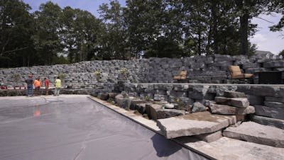Building a Backyard Pool Retreat with Outcropping Walls